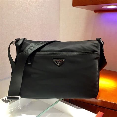 mens sling bag prada|Prada men's bag price.